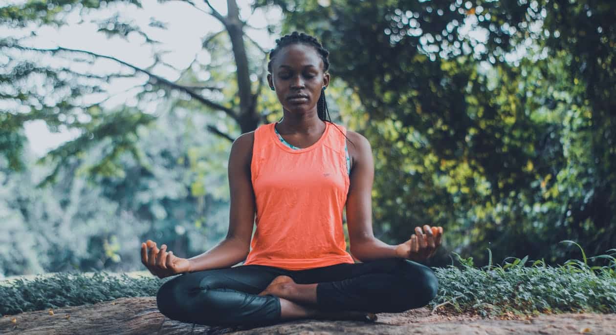 woman-meditating in the outdoors