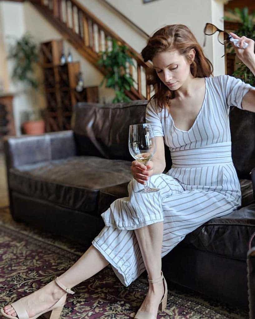 Katherine Cunningham sitting on sofa